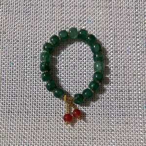Handmade Green Jade Stretch Bracelet with Small Rust Tasseled Design